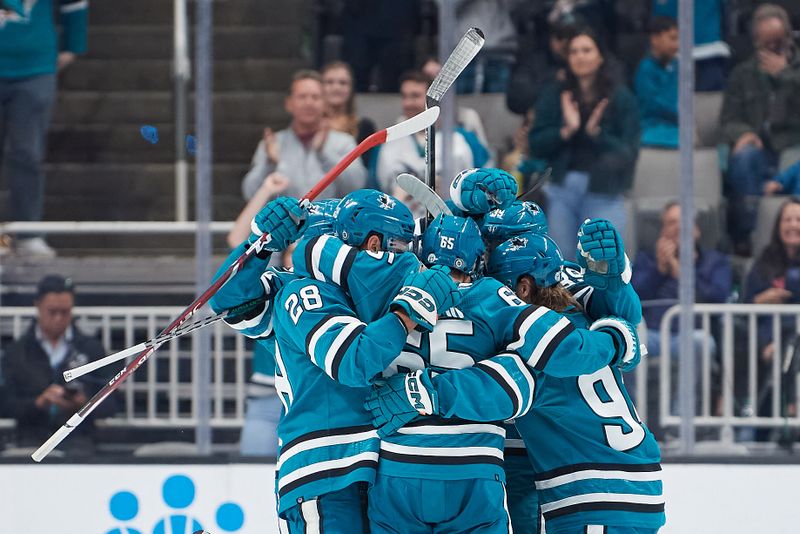 Oct 29, 2022; San Jose, California, USA; San Jose Sharks defenseman Erik Karlsson (65) celebrates with teammates after scoring the game-tying goal against the Tampa Bay Lightning during the third period at SAP Center at San Jose. Mandatory Credit: Robert Edwards-USA TODAY Sports