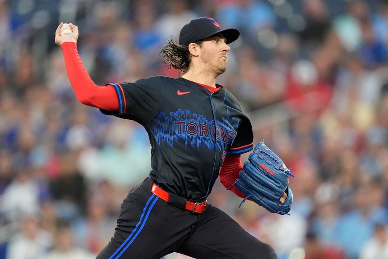 Sep 13, 2024; Toronto, Ontario, CAN; Toronto Blue Jays starting pitcher Kevin Gausman (34) pitches to the St. Louis Cardinals during the first inning at Rogers Centre. Mandatory Credit: John E. Sokolowski-Imagn Images