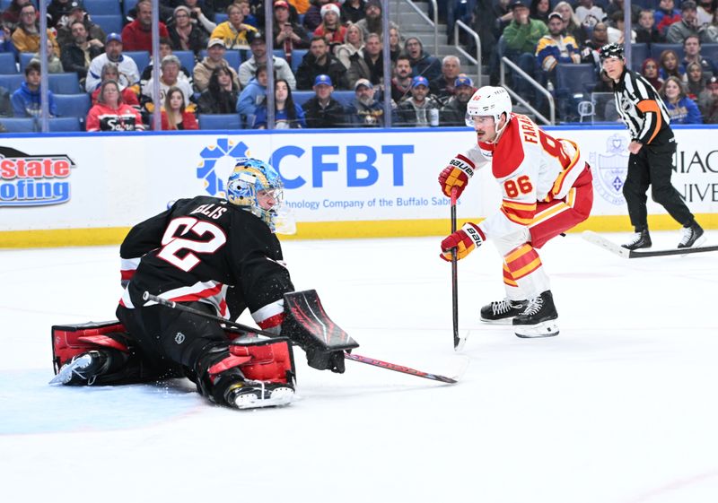 Nov 19, 2025; Buffalo, New York, USA; Calgary Flames left wing Joel Farabee (86) scores a goal against Buffalo Sabres goaltender Colten Ellis (92) in the third period at KeyBank Center. Mandatory Credit: Mark Konezny-Imagn Images