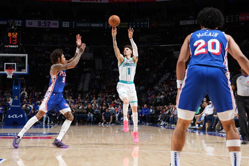 PHILADELPHIA, PA - NOVEMBER 10: LaMelo Ball #1 of the Charlotte Hornets shoots the ball during the game against the Philadelphia 76ers on November 10, 2024 at the Wells Fargo Center in Philadelphia, Pennsylvania NOTE TO USER: User expressly acknowledges and agrees that, by downloading and/or using this Photograph, user is consenting to the terms and conditions of the Getty Images License Agreement. Mandatory Copyright Notice: Copyright 2024 NBAE (Photo by Jesse D. Garrabrant/NBAE via Getty Images)