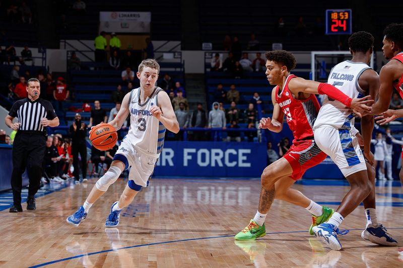 Feb 10, 2023; Colorado Springs, Colorado, USA; Air Force Falcons guard Jake Heidbreder (3) controls the ball as New Mexico Lobos guard Javonte Johnson (13) moves around guard Ethan Taylor (5) in the second half at Clune Arena. Mandatory Credit: Isaiah J. Downing-USA TODAY Sports