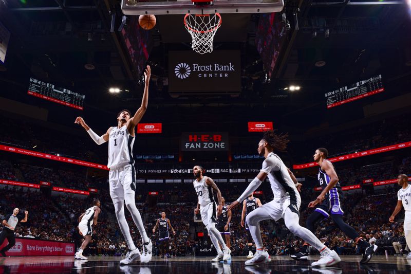 SAN ANTONIO, TX - NOVEMBER 11: Victor Wembanyama #1 of the San Antonio Spurs goes up for the rebound during the game against the Sacramento Kings` on November 11, 2024 at the Frost Bank Center in San Antonio, Texas. NOTE TO USER: User expressly acknowledges and agrees that, by downloading and or using this photograph, user is consenting to the terms and conditions of the Getty Images License Agreement. Mandatory Copyright Notice: Copyright 2024 NBAE (Photos by Garrett Ellwood/NBAE via Getty Images)