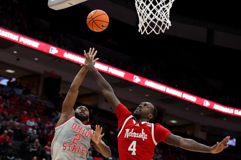 Mar 4, 2025; Columbus, Ohio, USA;  Ohio State Buckeyes guard Bruce Thornton (2) shoots over Nebraska Cornhuskers forward Juwan Gary (4) during the second half at Value City Arena. Mandatory Credit: Joseph Maiorana-Imagn Images