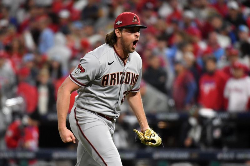 Oct 24, 2023; Philadelphia, Pennsylvania, USA; Arizona Diamondbacks relief pitcher Kevin Ginkel (37) reacts after an out against the Philadelphia Phillies in the eighth inning during game seven of the NLCS for the 2023 MLB playoffs at Citizens Bank Park. Mandatory Credit: Eric Hartline-USA TODAY Sports