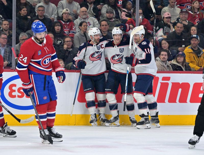 Mar 26, 2026; Montreal, Quebec, CAN; Columbus Blue Jackets defenseman Damon Severson (78) celebrates with teammates after scoring a goal against the Montreal Canadiens during the first period at the Bell Centre. Mandatory Credit: Eric Bolte-Imagn Images Mar 26, 2026; Montreal, Quebec, CAN; Columbus Blue Jackets defenseman Damon Severson (78) celebrates with teammates after scoring a goal against the Montreal Canadiens during the first period at the Bell Centre. Mandatory Credit: Eric Bolte-Imagn Images