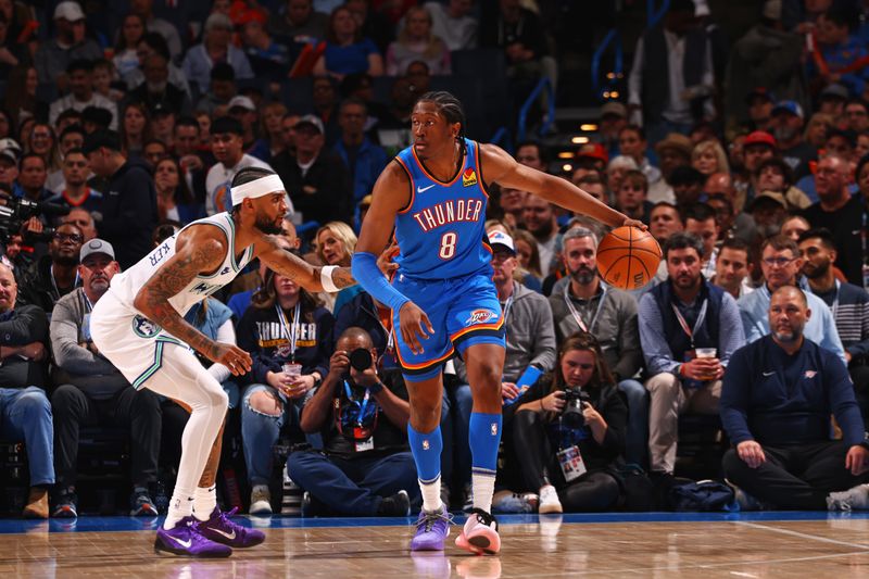 OKLAHOMA CITY, OK - JANUARY 29: Jalen Williams #8 of the Oklahoma City Thunder handles the ball during the game against the Minnesota Timberwolves on January 29, 2024 at Paycom Arena in Oklahoma City, Oklahoma. NOTE TO USER: User expressly acknowledges and agrees that, by downloading and or using this photograph, User is consenting to the terms and conditions of the Getty Images License Agreement. Mandatory Copyright Notice: Copyright 2024 NBAE (Photo by Zach Beeker/NBAE via Getty Images)