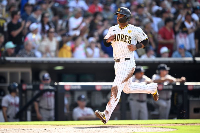 Jul 13, 2024; San Diego, California, USA; San Diego Padres third baseman Donovan Solano (39) scores a run on a double hit by right fielder David Peralta (not pictured) during the second inning against the Atlanta Braves at Petco Park. Mandatory Credit: Orlando Ramirez-USA TODAY Sports 
