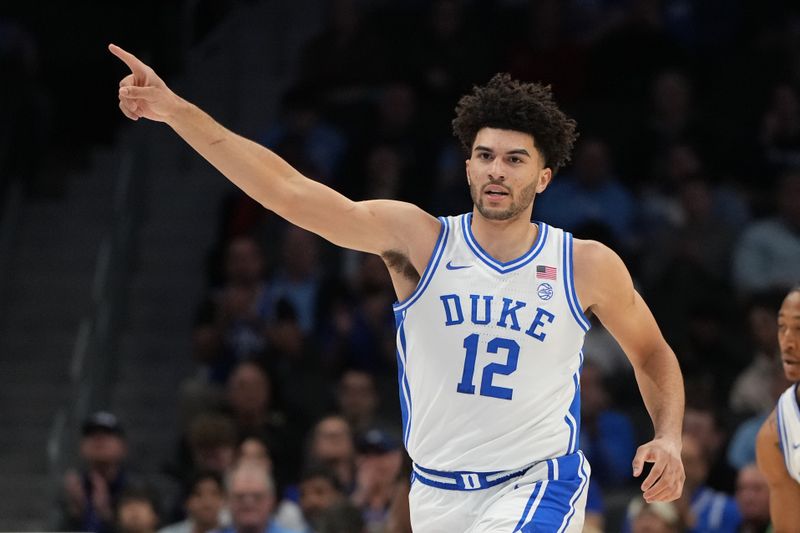 Mar 12, 2026; Charlotte, NC, USA; Duke Blue Devils forward Cameron Boozer (12) reacts in the first half at Spectrum Center. Mandatory Credit: Bob Donnan-Imagn Images