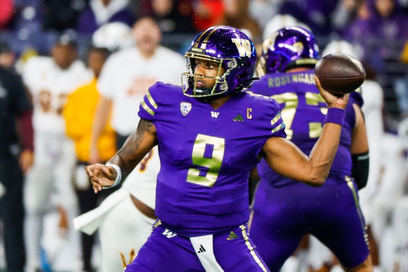 Oct 21, 2023; Seattle, Washington, USA; Washington Huskies quarterback Michael Penix Jr. (9) passes against the Arizona State Sun Devils during the second quarter at Alaska Airlines Field at Husky Stadium. Mandatory Credit: Joe Nicholson-USA TODAY Sports