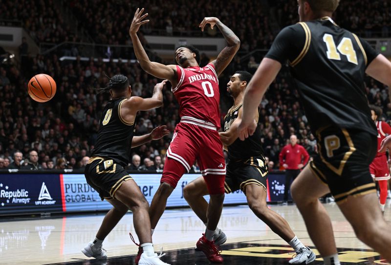 Feb 20, 2026; West Lafayette, Indiana, USA; Indiana Hoosiers guard Jasai Miles (0) loses control against the Purdue Boilermakers during the first half at Mackey Arena. Mandatory Credit: Marc Lebryk-Imagn Images