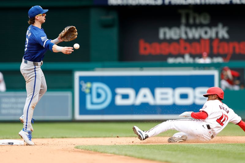 Sep 26, 2024; Washington, District of Columbia, USA; Kansas City Royals shortstop Bobby Witt Jr. (7) attempts to turn a double play at second base ahead of a slide by Washington Nationals second baseman Darren Baker (10) during the eighth inning at Nationals Park. Mandatory Credit: Geoff Burke-Imagn Images