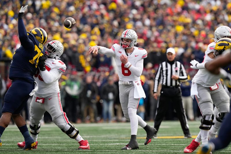 Nov 25, 2023; Ann Arbor, Michigan, USA; Ohio State Buckeyes quarterback Kyle McCord (6) throws a pass during the first half of the NCAA football game against the Michigan Wolverines at Michigan Stadium. Mandatory Credit: Adam Cairns-USA TODAY Sports