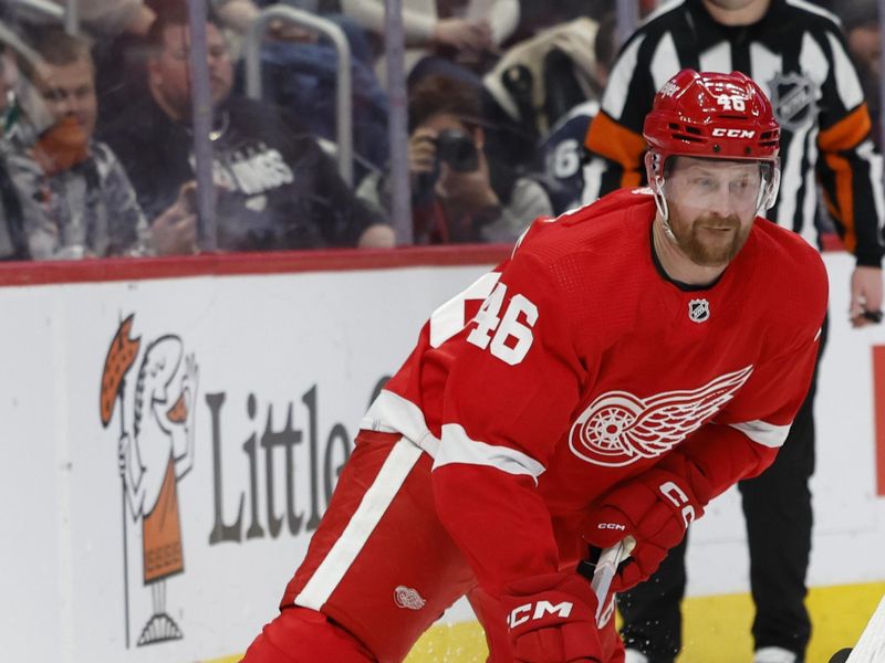 Feb 22, 2024; Detroit, Michigan, USA;  Detroit Red Wings defenseman Jeff Petry (46) skates with the puck in the second period against the Colorado Avalanche at Little Caesars Arena. Mandatory Credit: Rick Osentoski-USA TODAY Sports