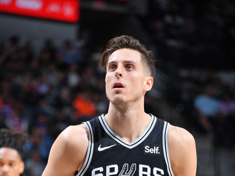 SAN ANTONIO, TX - MARCH 29: Zach Collins #23 of the San Antonio Spurs shoots a free throw during the game against the New York Knicks on March 29, 2024 at the Frost Bank Center in San Antonio, Texas. NOTE TO USER: User expressly acknowledges and agrees that, by downloading and or using this photograph, user is consenting to the terms and conditions of the Getty Images License Agreement. Mandatory Copyright Notice: Copyright 2024 NBAE (Photos by Michael Gonzales/NBAE via Getty Images)