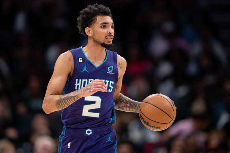 CHARLOTTE, NORTH CAROLINA - NOVEMBER 05: James Bouknight #2 of the Charlotte Hornets brings the ball up court in the second quarter during their game against the Brooklyn Nets at Spectrum Center on November 05, 2022 in Charlotte, North Carolina. NOTE TO USER: User expressly acknowledges and agrees that, by downloading and or using this photograph, User is consenting to the terms and conditions of the Getty Images License Agreement. (Photo by Jacob Kupferman/Getty Images)