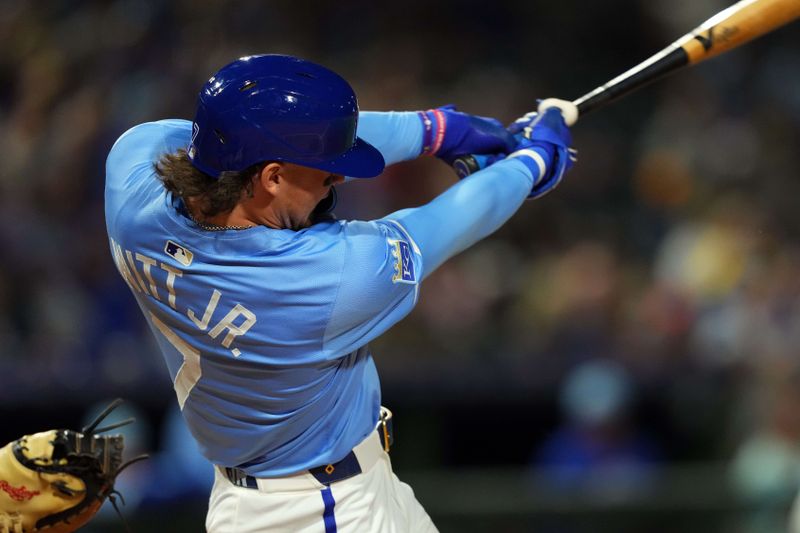 Mar 5, 2024; Surprise, Arizona, USA; Kansas City Royals shortstop Bobby Witt Jr. (7) bats against the Chicago Cubs during the third inning at Surprise Stadium. Mandatory Credit: Joe Camporeale-USA TODAY Sports