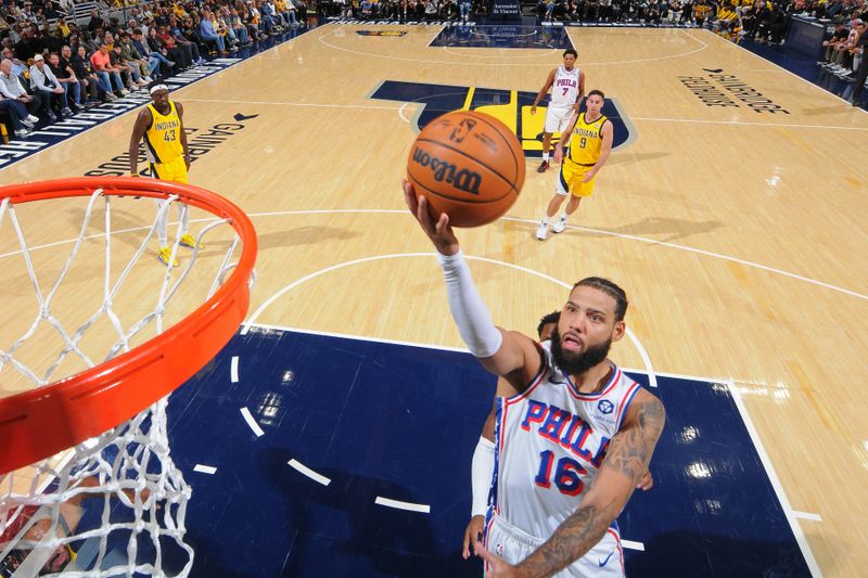 INDIANAPOLIS, IN - OCTOBER 27: Caleb Martin #16 of the Philadelphia 76ers drives to the basket during the game against the Indiana Pacers on October 27, 2024 at Gainbridge Fieldhouse in Indianapolis, Indiana. NOTE TO USER: User expressly acknowledges and agrees that, by downloading and or using this Photograph, user is consenting to the terms and conditions of the Getty Images License Agreement. Mandatory Copyright Notice: Copyright 2024 NBAE (Photo by Ron Hoskins/NBAE via Getty Images)