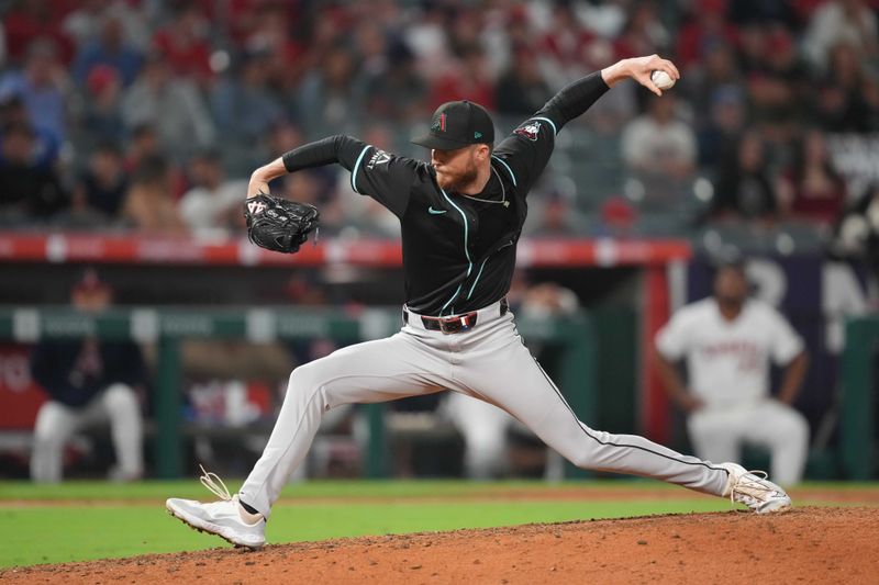 Jul 11, 2025; Anaheim, California, USA; Arizona Diamondbacks relief pitcher Kyle Backhus (43) throws in the ninth inning against the Los Angeles Angels at Angel Stadium. Mandatory Credit: Kirby Lee-Imagn Images