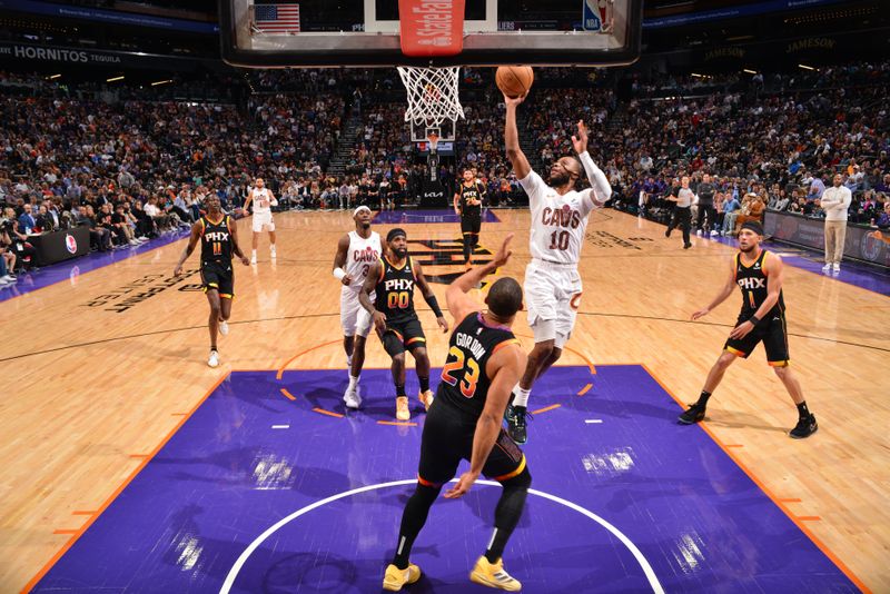 PHOENIX, AZ - APRIL 3:  Darius Garland #10 of the Cleveland Cavaliers goes to the basket during the game on April 3, 2024 at Footprint Center in Phoenix, Arizona. NOTE TO USER: User expressly acknowledges and agrees that, by downloading and or using this photograph, user is consenting to the terms and conditions of the Getty Images License Agreement. Mandatory Copyright Notice: Copyright 2024 NBAE (Photo by Barry Gossage/NBAE via Getty Images)