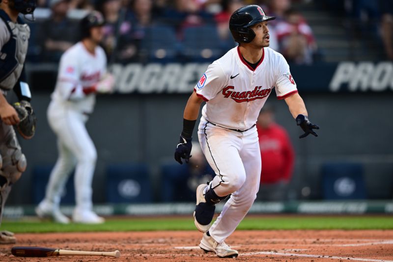 Apr 21, 2025; Cleveland, Ohio, USA; Cleveland Guardians left fielder Steven Kwan (38) watches the ball after hitting a single during the third inning against the New York Yankees at Progressive Field. Mandatory Credit: David Dermer-Imagn Images