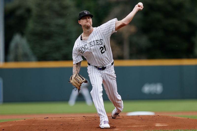 Aug 11, 2024; Denver, Colorado, USA; Colorado Rockies pitcher Kyle Freeland (21) pitches in the first inning against the Atlanta Braves at Coors Field. Mandatory Credit: Isaiah J. Downing-USA TODAY Sports