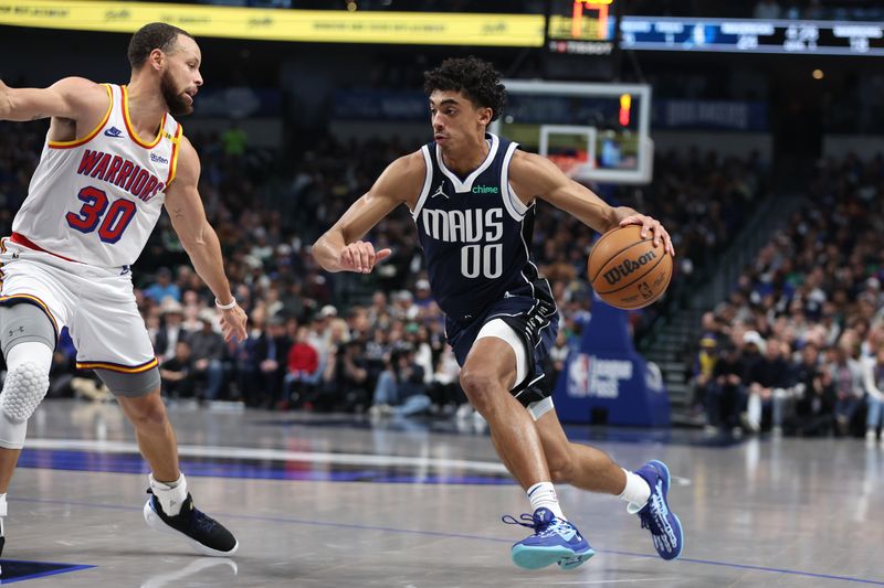 DALLAS, TX - FEBRUARY 12:  Max Christie #00 of the Dallas Mavericks handles the ball during the game against the Golden State Warriors on February 12, 2025 at American Airlines Center in Dallas, Texas. NOTE TO USER: User expressly acknowledges and agrees that, by downloading and or using this photograph, User is consenting to the terms and conditions of the Getty Images License Agreement. Mandatory Copyright Notice: Copyright 2025 NBAE (Photo by Tim Heitman/NBAE via Getty Images)