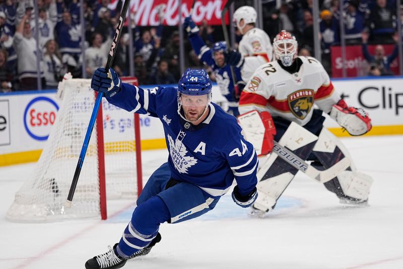 May 5, 2025; Toronto, Ontario, CAN; Toronto Maple Leafs defenseman Morgan Rielly (44) celebrates scoring against Florida Panthers goaltender Sergei Bobrovsky (72) during the first period of the second round of the 2025 Stanley Cup Playoffs at Scotiabank Arena. Mandatory Credit: John E. Sokolowski-Imagn Images