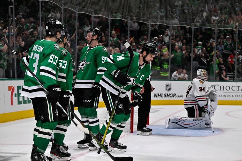 Oct 26, 2024; Dallas, Texas, USA; Dallas Stars left wing Jamie Benn (14) skates off the ice after he scores a goal against Chicago Blackhawks goaltender Petr Mrazek (34) during the second period at the American Airlines Center. Mandatory Credit: Jerome Miron-Imagn Images