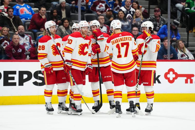 Dec 11, 2023; Denver, Colorado, USA; Members of the Calgary Flames huddle in the third period against the Calgary Flames at Ball Arena. Mandatory Credit: Ron Chenoy-USA TODAY Sports