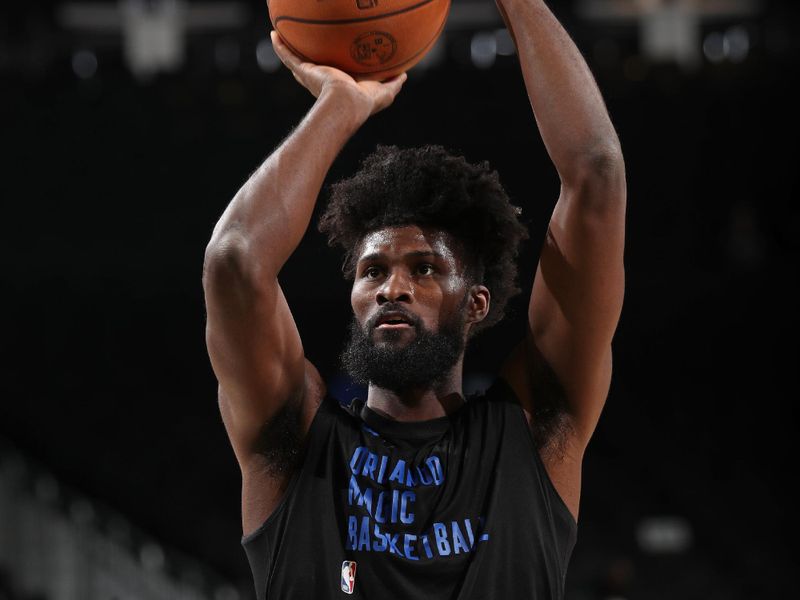 MILWAUKEE, WI - APRIL 10: Jonathan Isaac #1 of the Orlando Magic warms up before the game against the Milwaukee Bucks on April 10, 2024 at the Fiserv Forum Center in Milwaukee, Wisconsin. NOTE TO USER: User expressly acknowledges and agrees that, by downloading and or using this Photograph, user is consenting to the terms and conditions of the Getty Images License Agreement. Mandatory Copyright Notice: Copyright 2024 NBAE (Photo by Gary Dineen/NBAE via Getty Images).