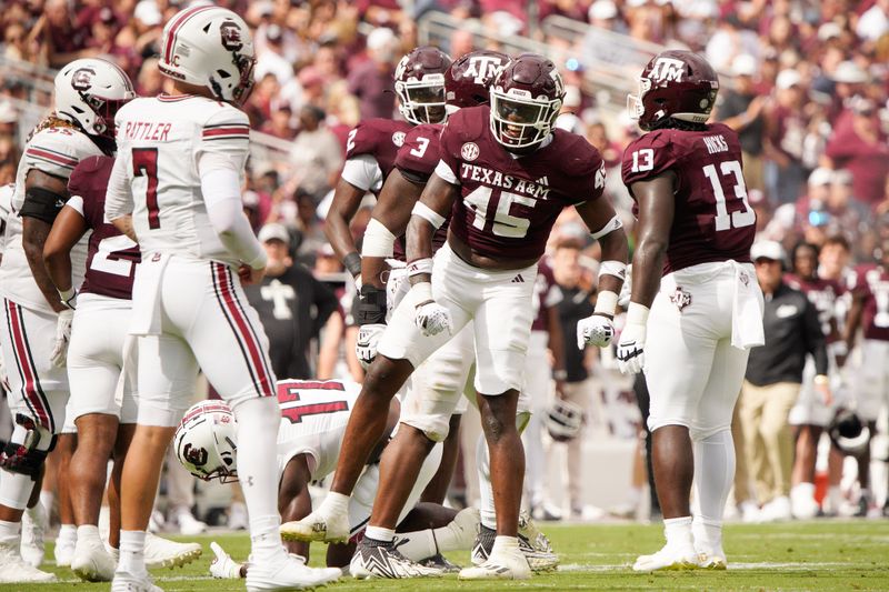 Oct 28, 2023; College Station, Texas, USA; Texas A&M Aggies linebacker Edgerrin Cooper (45) celebrates a tackle against the South Carolina Gamecocks during the second quarter at Kyle Field. Mandatory Credit: Dustin Safranek-USA TODAY Sports