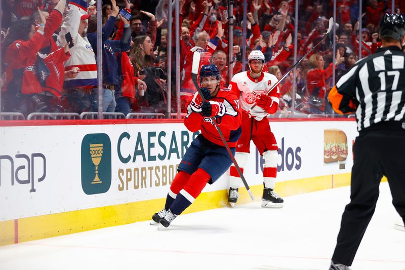 Mar 26, 2024; Washington, District of Columbia, USA; Washington Capitals center Dylan Strome (17) celebrates after scoring a goal against the Detroit Red Wings during the third period at Capital One Arena. Mandatory Credit: Amber Searls-USA TODAY Sports