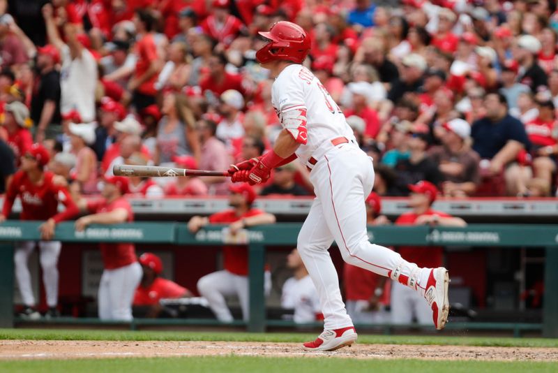 Jul 2, 2023; Cincinnati, Ohio, USA; Cincinnati Reds pinch hitter Tyler Stephenson (37) watches hitting a two-run home run against the San Diego Padres during the eighth inning at Great American Ball Park. Mandatory Credit: David Kohl-USA TODAY Sports