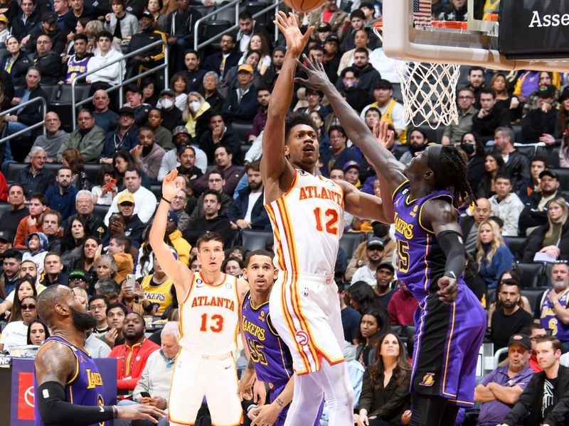 LOS ANGELES, CA - JANUARY 6: De'Andre Hunter #12 of the Atlanta Hawks shoots the ball during the game against the Los Angeles Lakers on January 6, 2023 at Crypto.Com Arena in Los Angeles, California. NOTE TO USER: User expressly acknowledges and agrees that, by downloading and/or using this Photograph, user is consenting to the terms and conditions of the Getty Images License Agreement. Mandatory Copyright Notice: Copyright 2023 NBAE (Photo by Andrew D. Bernstein/NBAE via Getty Images)