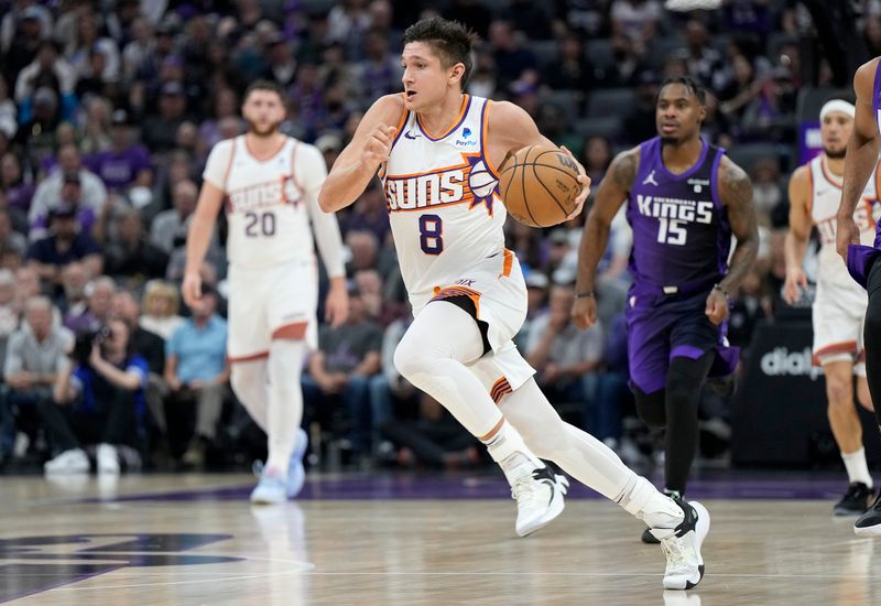 SACRAMENTO, CALIFORNIA - APRIL 12: Grayson Allen #8 of the Phoenix Suns dribbles the ball up court against the Sacramento Kings during the first half of an NBA basketball game at Golden 1 Center on April 12, 2024 in Sacramento, California. NOTE TO USER: User expressly acknowledges and agrees that, by downloading and or using this photograph, User is consenting to the terms and conditions of the Getty Images License Agreement. (Photo by Thearon W. Henderson/Getty Images)