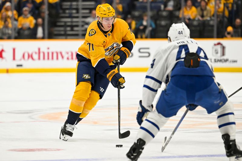 Dec 20, 2025; Nashville, Tennessee, USA;  Nashville Predators right wing Matthew Wood (71) skates with the puck against the Toronto Maple Leafs during the first period at Bridgestone Arena. Mandatory Credit: Steve Roberts-Imagn Images