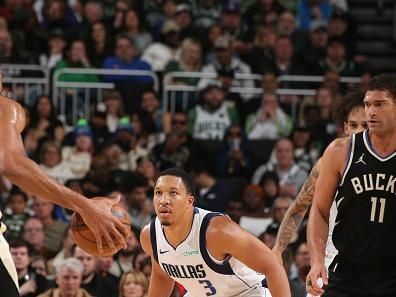 MILWAUKEE, WI - NOVEMBER 18: Grant Williams #3 of the Dallas Mavericks plays defense against Milwaukee Bucks  on November 18, 2023 at the Fiserv Forum Center in Milwaukee, Wisconsin. NOTE TO USER: User expressly acknowledges and agrees that, by downloading and or using this Photograph, user is consenting to the terms and conditions of the Getty Images License Agreement. Mandatory Copyright Notice: Copyright 2023 NBAE (Photo by Gary Dineen/NBAE via Getty Images).