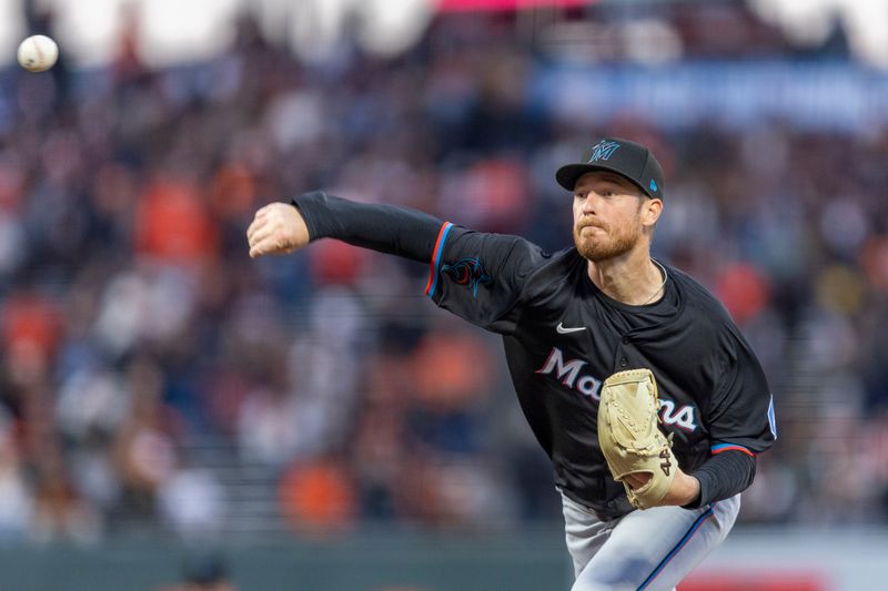 Aug 30, 2024; San Francisco, California, USA; Miami Marlins starting pitcher Adam Oller (77) throws against the San Francisco Giants during the first inning at Oracle Park. Mandatory Credit: John Hefti-USA TODAY Sports