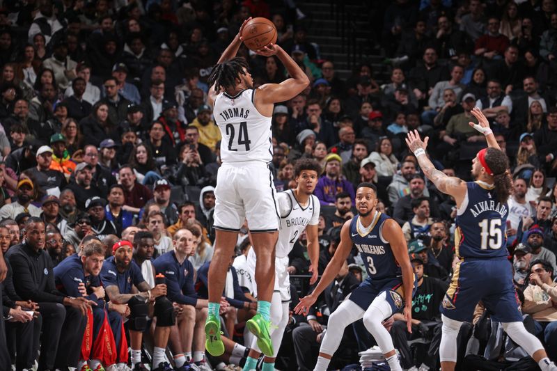 BROOKLYN, NY - MARCH 19: Cam Thomas #24 of the Brooklyn Nets shoots the ball during the game against the New Orleans Pelicans  on March 19, 2024 at Barclays Center in Brooklyn, New York. NOTE TO USER: User expressly acknowledges and agrees that, by downloading and or using this Photograph, user is consenting to the terms and conditions of the Getty Images License Agreement. Mandatory Copyright Notice: Copyright 2024 NBAE (Photo by Nathaniel S. Butler/NBAE via Getty Images)