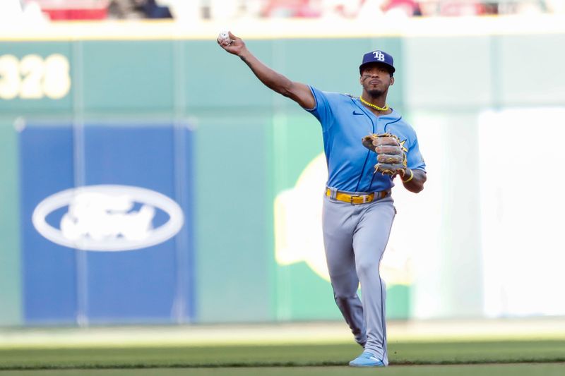 Apr 18, 2023; Cincinnati, Ohio, USA; Tampa Bay Rays shortstop Wander Franco (5) throws to first to get Cincinnati Reds second baseman Jonathan India (not pictured) out in the first inning at Great American Ball Park. Mandatory Credit: Katie Stratman-USA TODAY Sports