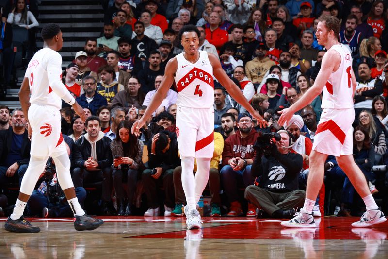 TORONTO, CANADA - OCTOBER 28: Scottie Barnes #4 of the Toronto Raptors looks on during the game against the Denver Nuggets on October 28, 2024 at the Scotiabank Arena in Toronto, Ontario, Canada.  NOTE TO USER: User expressly acknowledges and agrees that, by downloading and or using this Photograph, user is consenting to the terms and conditions of the Getty Images License Agreement.  Mandatory Copyright Notice: Copyright 2024 NBAE (Photo by Vaughn Ridley/NBAE via Getty Images)