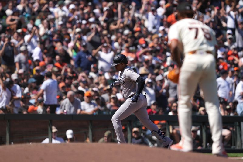 Jun 2, 2024; San Francisco, California, USA; New York Yankees right fielder Juan Soto (center) rounds the bases after hitting a home run against San Francisco Giants relief pitcher Camilo Doval (75) during the ninth inning at Oracle Park. Mandatory Credit: Darren Yamashita-USA TODAY Sports