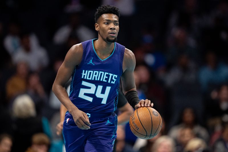 CHARLOTTE, NORTH CAROLINA - DECEMBER 03: Brandon Miller #24 of the Charlotte Hornets brings the ball up court in the first quarter of the game against the Philadelphia 76ers during the Emirates NBA Cup at Spectrum Center on December 03, 2024 in Charlotte, North Carolina. NOTE TO USER: User expressly acknowledges and agrees that, by downloading and or using this photograph, User is consenting to the terms and conditions of the Getty Images License Agreement. (Photo by Jacob Kupferman/Getty Images)