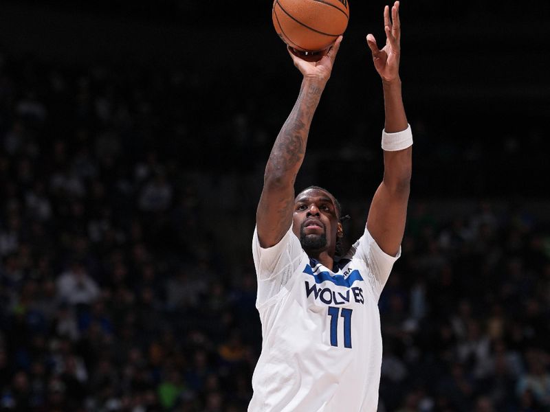 MINNEAPOLIS, MN -  MARCH 27: Naz Reid #11 of the Minnesota Timberwolves shoots the ball during the game against the Detroit Pistons on March 27, 2024 at Target Center in Minneapolis, Minnesota. NOTE TO USER: User expressly acknowledges and agrees that, by downloading and or using this Photograph, user is consenting to the terms and conditions of the Getty Images License Agreement. Mandatory Copyright Notice: Copyright 2024 NBAE (Photo by Jordan Johnson/NBAE via Getty Images)