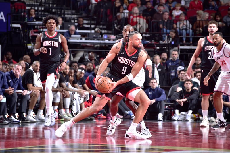 HOUSTON, TX - NOVEMBER 15: Dillon Brooks #9 of the Houston Rockets looks to pass the ball during the game against the LA Clippers during the Emirates NBA Cup game on November 15, 2024 at the Toyota Center in Houston, Texas. NOTE TO USER: User expressly acknowledges and agrees that, by downloading and or using this photograph, User is consenting to the terms and conditions of the Getty Images License Agreement. Mandatory Copyright Notice: Copyright 2024 NBAE (Photo by Logan Riely/NBAE via Getty Images)