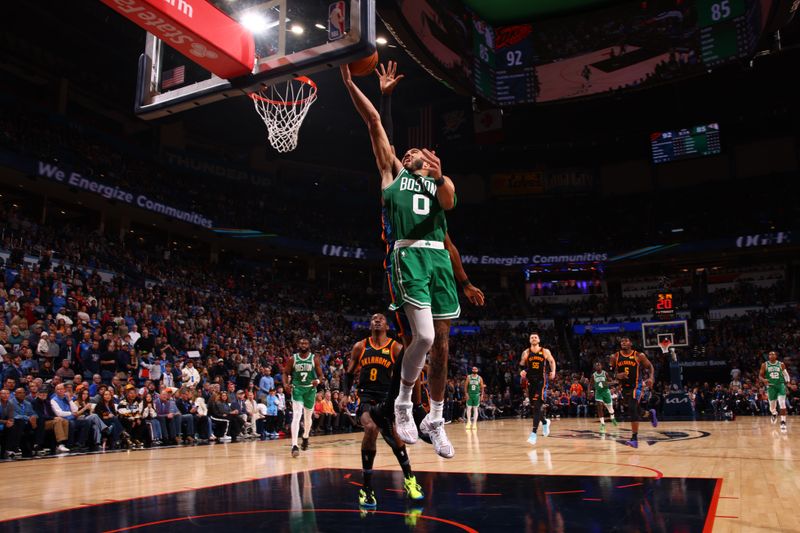 OKLAHOMA CITY, OK - JANUARY 5: Jayson Tatum #0 of the Boston Celtics drives to the basket during the game against the Oklahoma City Thunder on January 5, 2025 at Paycom Center in Oklahoma City, Oklahoma. NOTE TO USER: User expressly acknowledges and agrees that, by downloading and or using this photograph, User is consenting to the terms and conditions of the Getty Images License Agreement. Mandatory Copyright Notice: Copyright 2025 NBAE (Photo by Zach Beeker/NBAE via Getty Images)