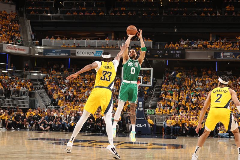 INDIANAPOLIS, IN - MAY 27: Jayson Tatum #0 of the Boston Celtics shoots a three point basket during the game against the Indiana Pacers during Game 4 of the Eastern Conference Finals of the 2024 NBA Playoffs on May 27, 2024 at Gainbridge Fieldhouse in Indianapolis, Indiana. NOTE TO USER: User expressly acknowledges and agrees that, by downloading and or using this Photograph, user is consenting to the terms and conditions of the Getty Images License Agreement. Mandatory Copyright Notice: Copyright 2024 NBAE (Photo by Nathaniel S. Butler/NBAE via Getty Images)