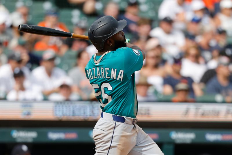 Jul 12, 2025; Detroit, Michigan, USA; Seattle Mariners outfielder Randy Arozarena (56) hits a two run home run in the eighth inning against the Detroit Tigers at Comerica Park. Mandatory Credit: Rick Osentoski-Imagn Images