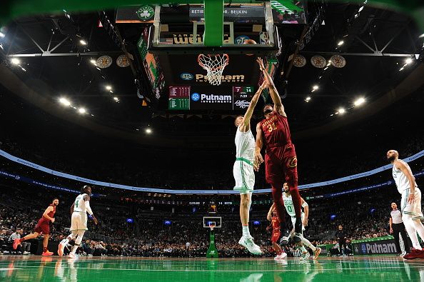 BOSTON, MA - DECEMBER 14: Jarrett Allen #31 of the Cleveland Cavaliers shoots the ball over defender Kristaps Porzingis #8 of the Boston Celtics during the game on December 14, 2023 at the TD Garden in Boston, Massachusetts. NOTE TO USER: User expressly acknowledges and agrees that, by downloading and or using this photograph, User is consenting to the terms and conditions of the Getty Images License Agreement. Mandatory Copyright Notice: Copyright 2023 NBAE  (Photo by Brian Babineau/NBAE via Getty Images)