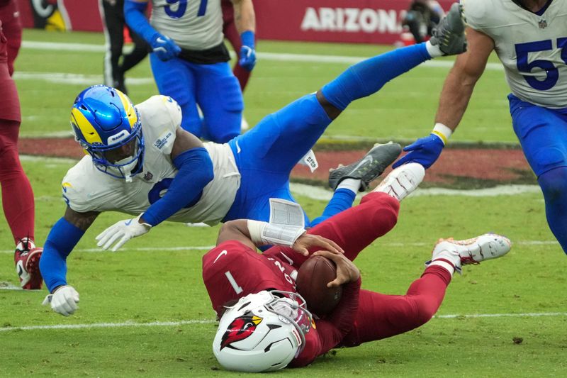 Los Angeles Rams safety Kamren Curl (3) tackles Arizona Cardinals linebacker Kyzir White (7) during the second half of an NFL football game, Sunday, Sept. 15, 2024, in Glendale, Ariz. (AP Photo/Rick Scuteri)